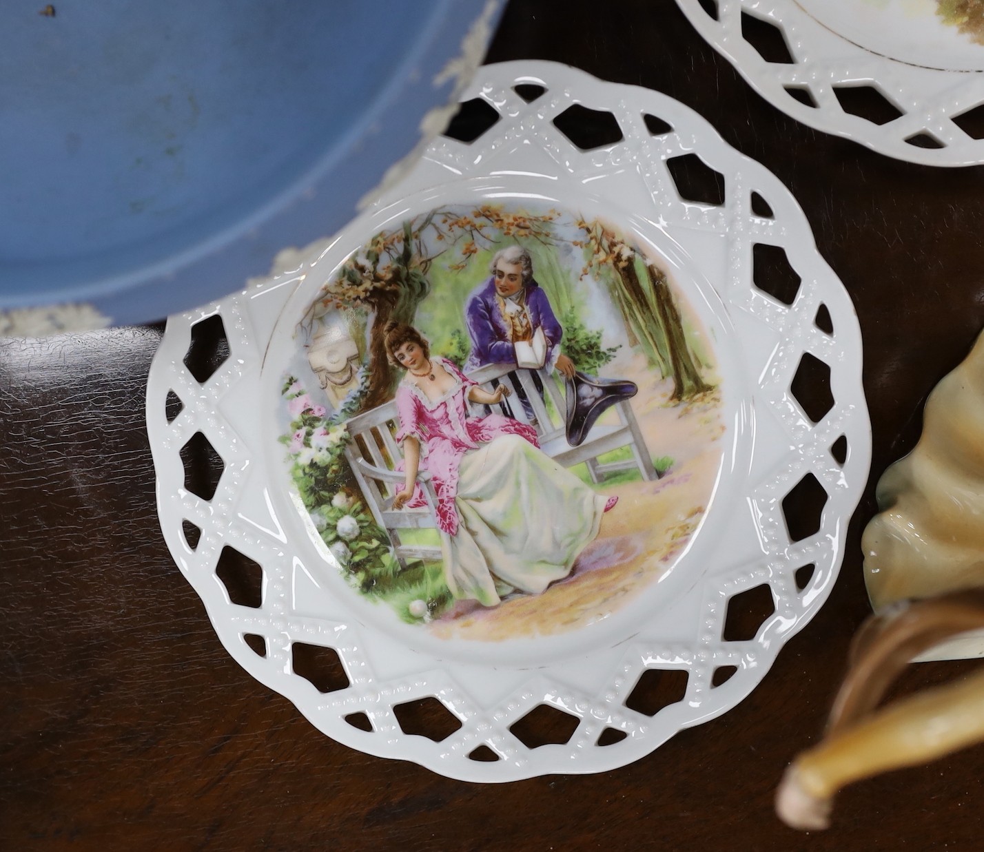 An Art Deco Katzhutte a female dancer, a Wedgwood fruit bowl and a pair of basketweave dishes, tallest 23cm